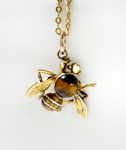 Gold, tiger's eye and enamel bee pendant "Melina"