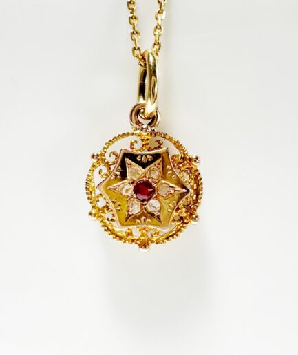 Pendentif or et grenat "Astrelle"